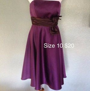Plum cocktail dress with brown accent